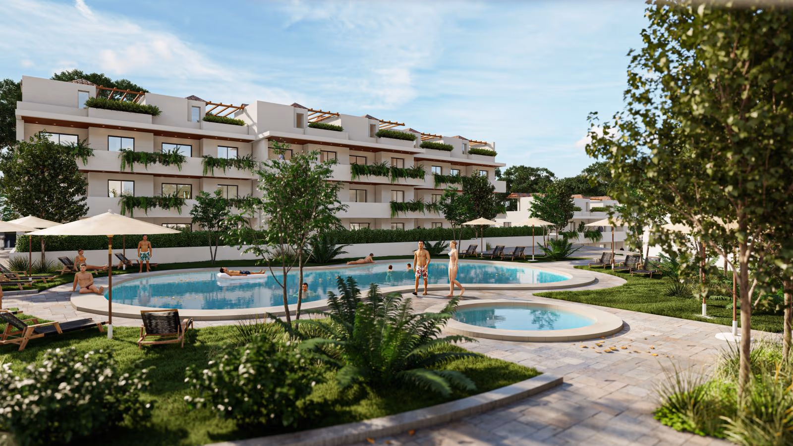 Las dos piscinas comunitarias de agua salina de Coral Mijas Residencial con hamacas y jardines